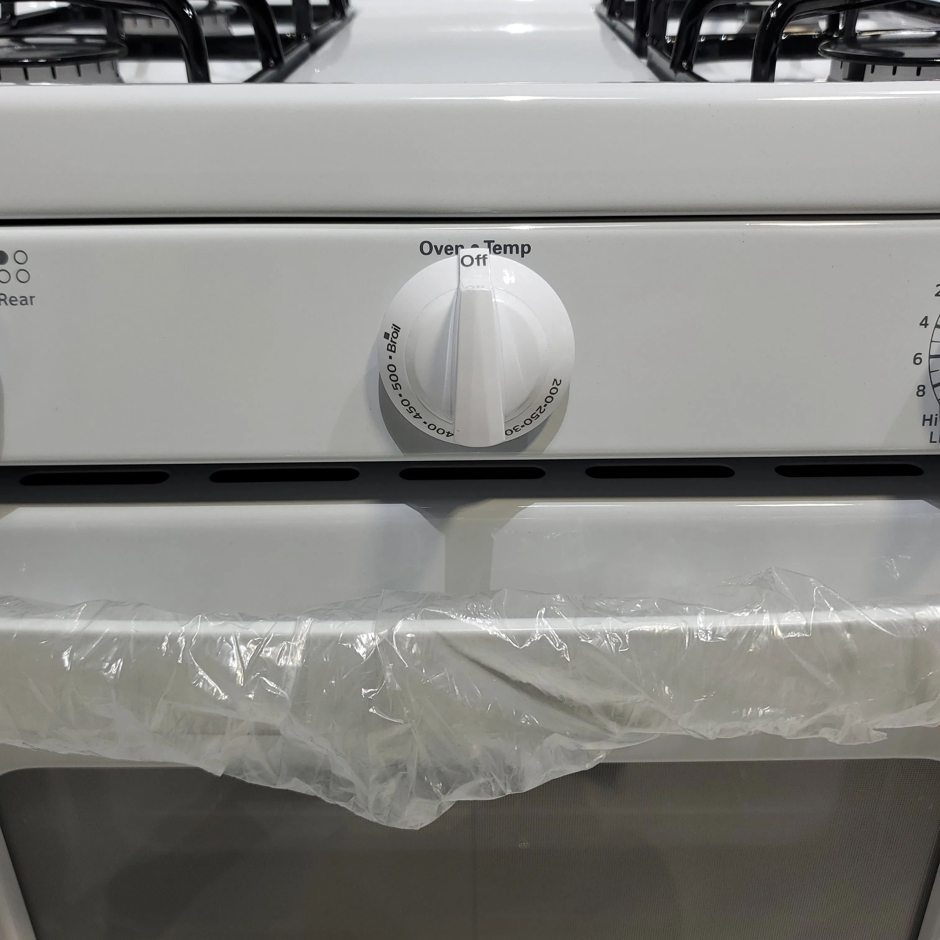 White Hotpoint 4.8 cu. ft. 4 Burner Freestanding Gas Range with Broiler Drawer - Scratch & Dent - Minor