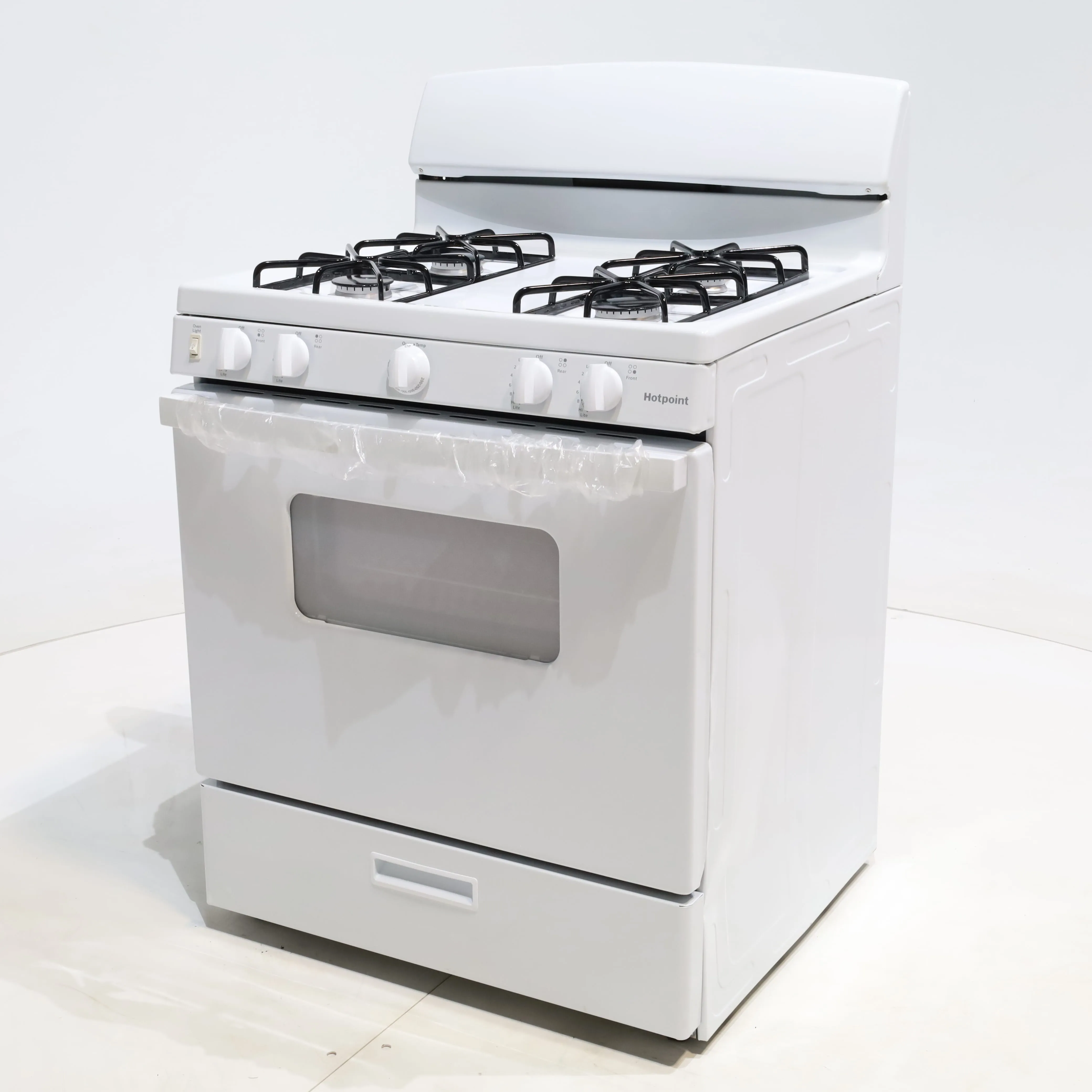 White Hotpoint 4.8 cu. ft. 4 Burner Freestanding Gas Range with Broiler Drawer - Scratch & Dent - Minor
