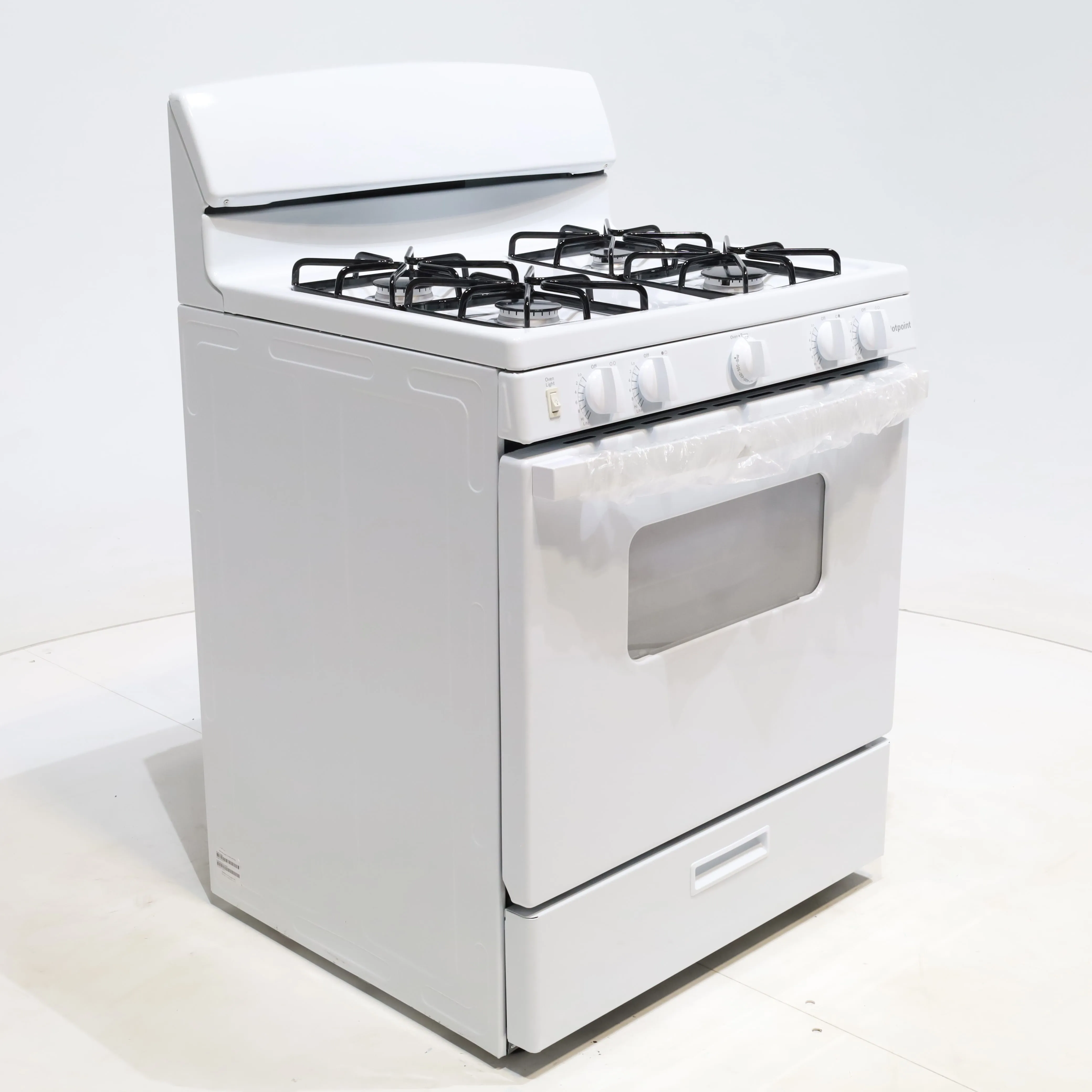 White Hotpoint 4.8 cu. ft. 4 Burner Freestanding Gas Range with Broiler Drawer - Scratch & Dent - Minor