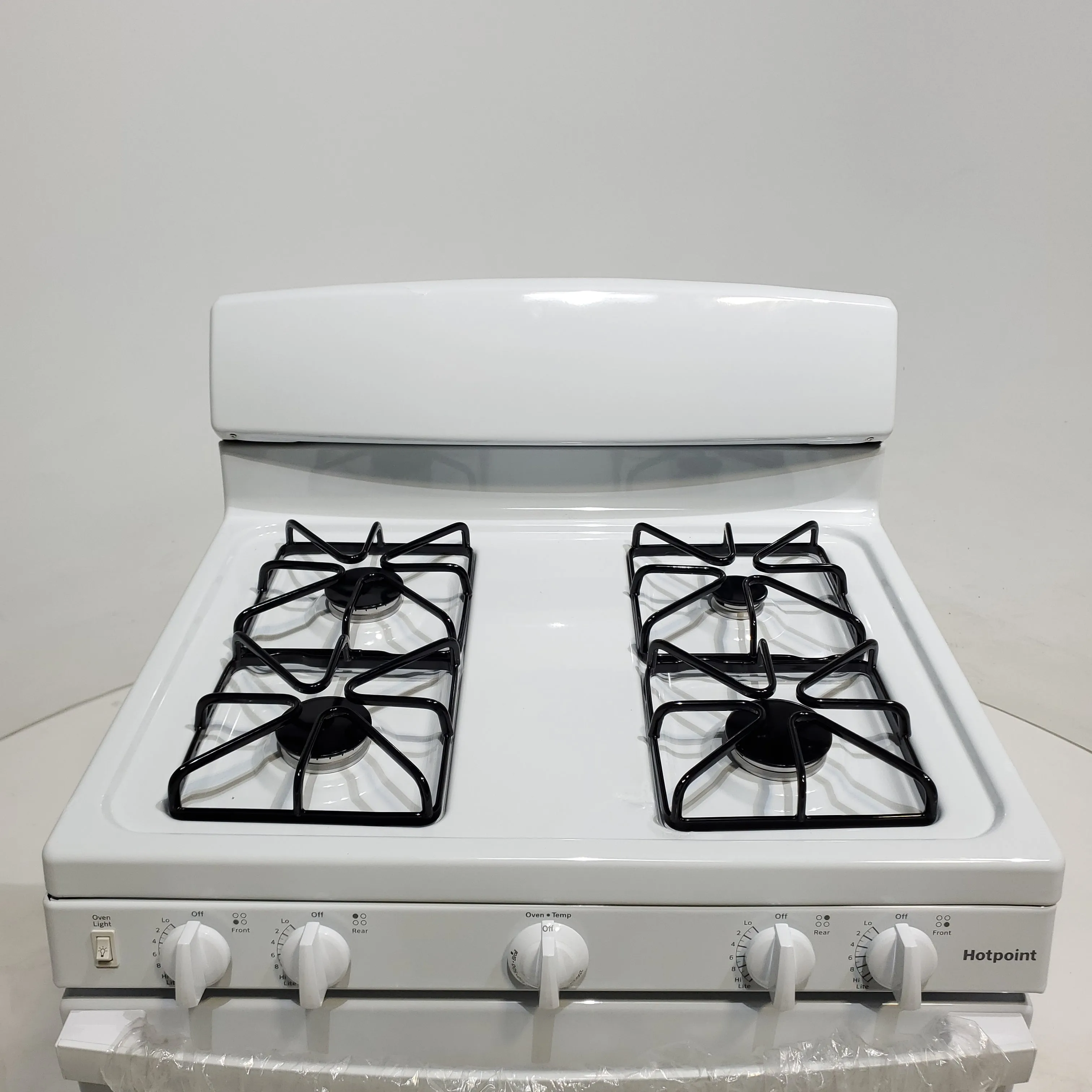 White Hotpoint 4.8 cu. ft. 4 Burner Freestanding Gas Range with Broiler Drawer - Scratch & Dent - Minor