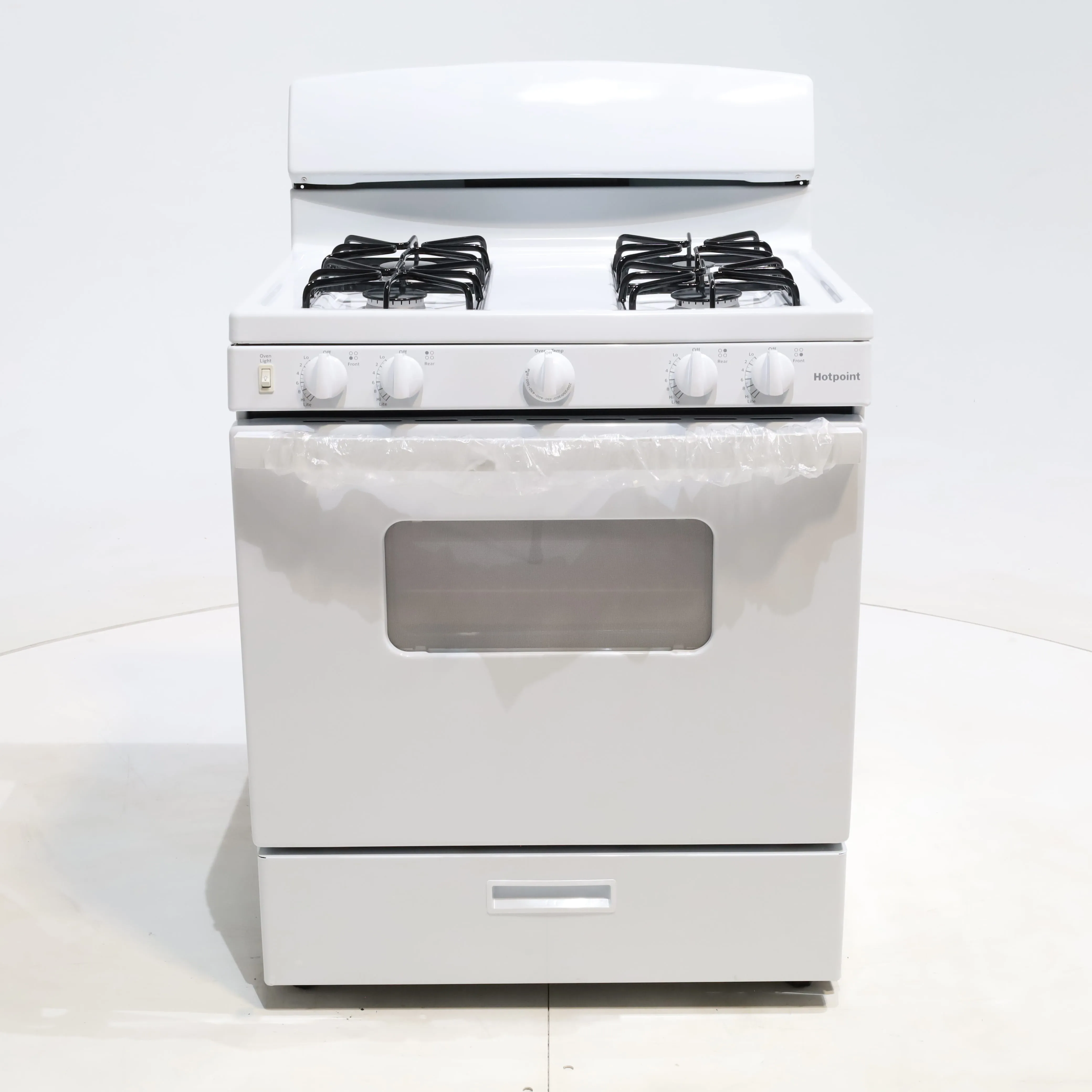 White Hotpoint 4.8 cu. ft. 4 Burner Freestanding Gas Range with Broiler Drawer - Scratch & Dent - Minor